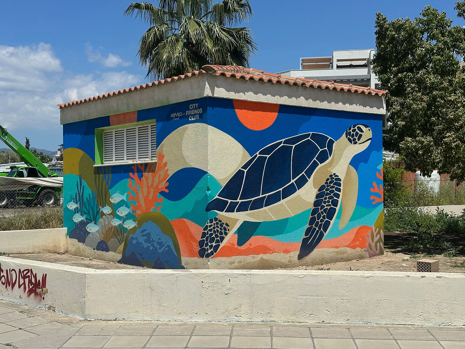 Sea turtle mural on a municipal utility building